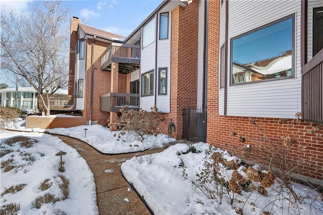 view of snow covered property