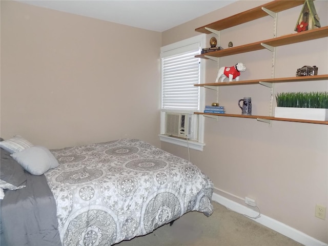 bedroom featuring carpet and cooling unit