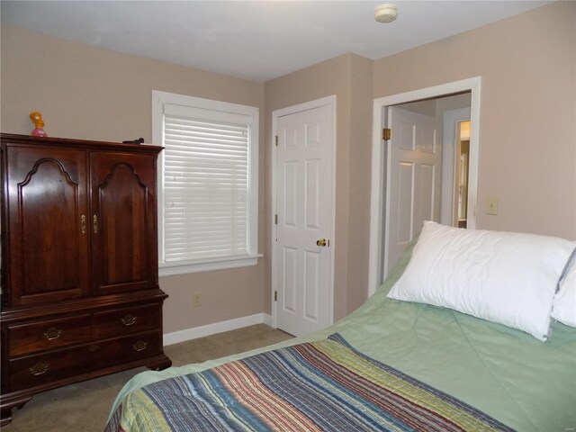 bedroom with light carpet