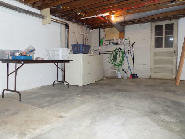 basement featuring separate washer and dryer