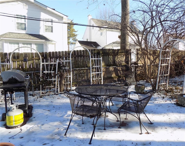 view of snow covered patio