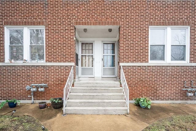 view of exterior entry featuring french doors