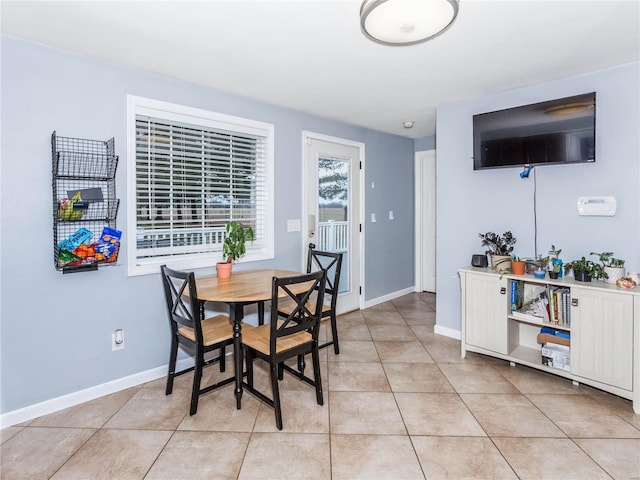 dining room featuring light tile patterned flooring