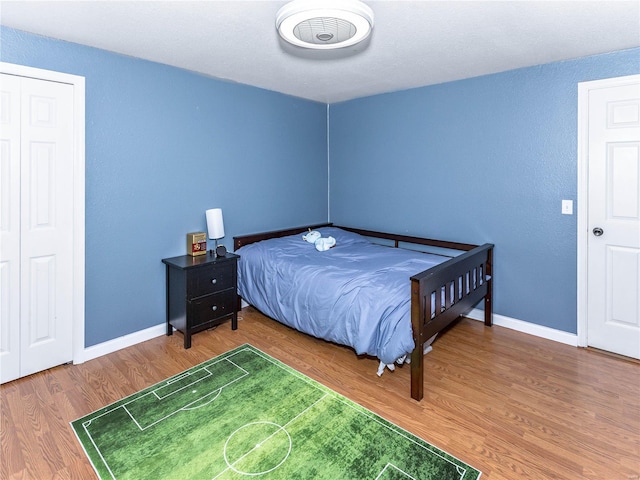 bedroom featuring hardwood / wood-style floors