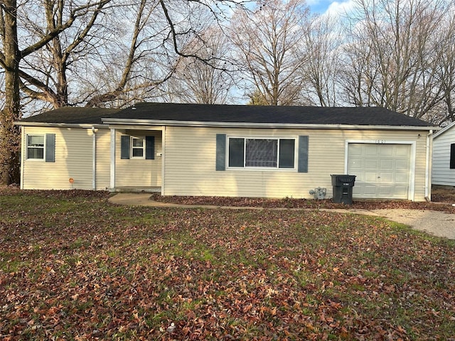 view of side of property with a garage