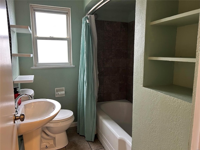 full bathroom with tile patterned flooring, shower / bath combo, toilet, and a healthy amount of sunlight