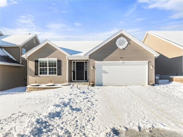 single story home with a garage