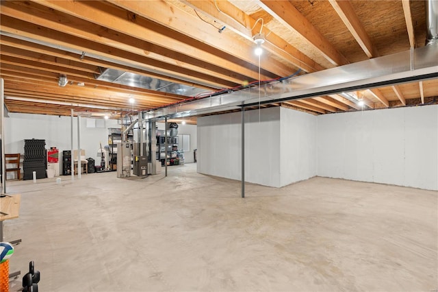 basement with heating unit and water heater