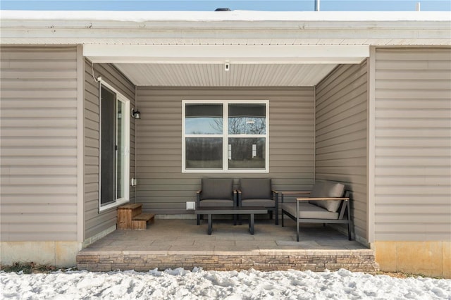 view of snow covered patio