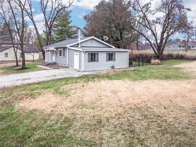 view of property exterior with a yard