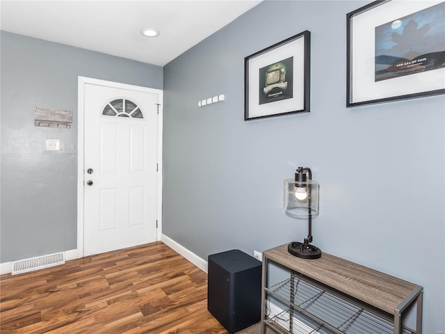 foyer entrance with wood-type flooring