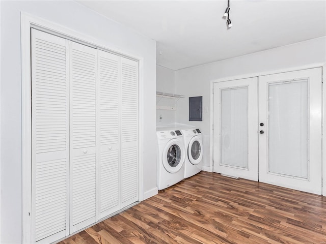 washroom featuring dark hardwood / wood-style floors, separate washer and dryer, electric panel, and french doors