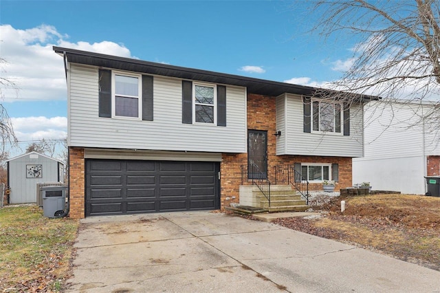 split foyer home featuring a storage unit and a garage