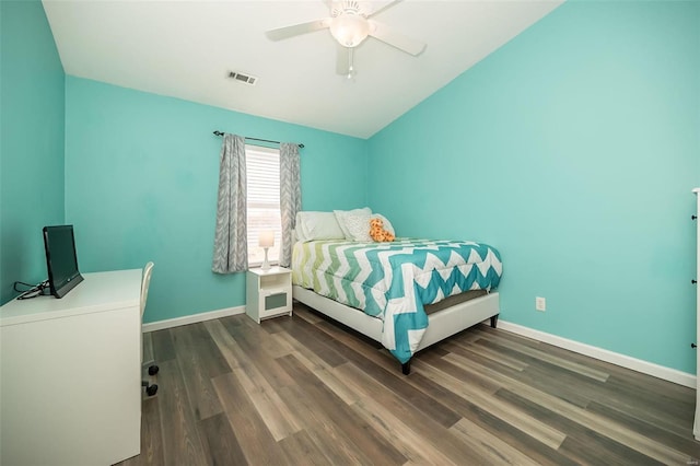 bedroom with visible vents, ceiling fan, baseboards, and wood finished floors