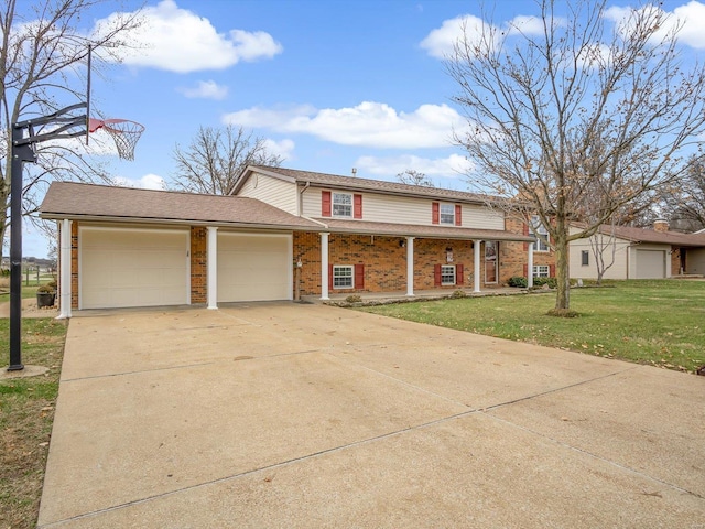 view of front facade featuring a front yard and a garage