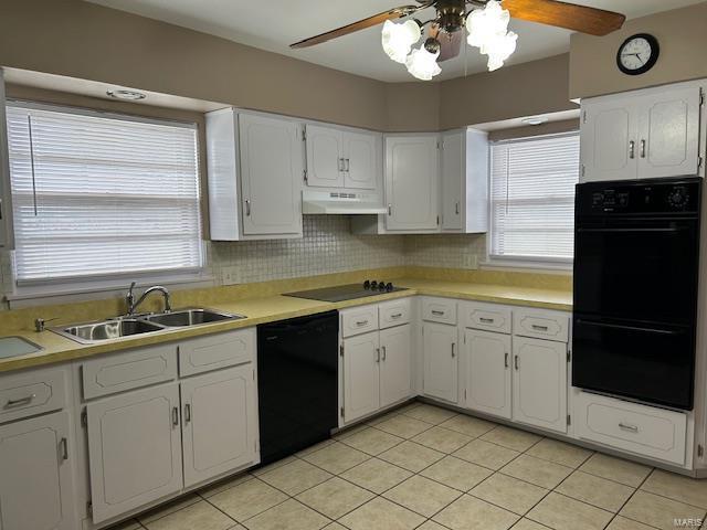 kitchen with ceiling fan, sink, black appliances, white cabinets, and light tile patterned flooring