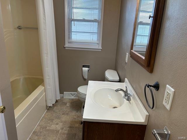 full bathroom featuring vanity, toilet, and shower / bath combo with shower curtain