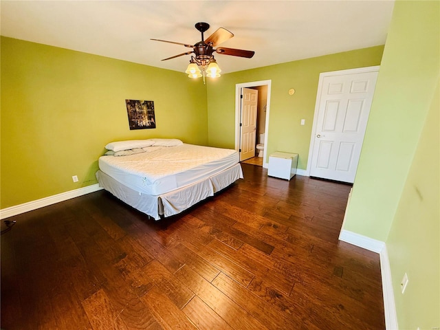 bedroom featuring ceiling fan and dark wood-type flooring