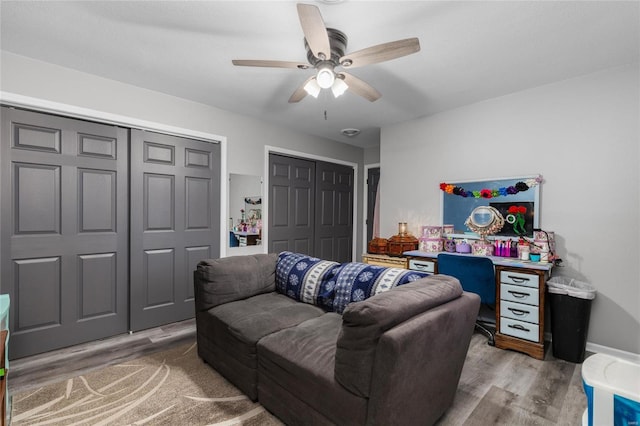 interior space with hardwood / wood-style flooring and ceiling fan