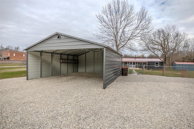 view of outbuilding featuring a carport