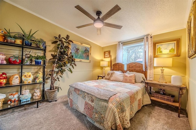 bedroom featuring ceiling fan, carpet floors, a textured ceiling, and ornamental molding