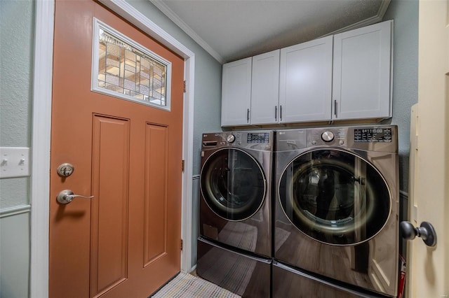 laundry room featuring washer and dryer, light tile patterned flooring, cabinets, and ornamental molding