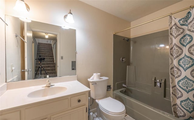 full bathroom with vanity, shower / bath combination with curtain, and toilet