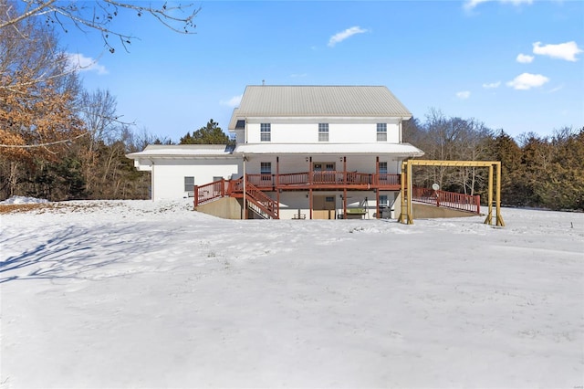 view of snow covered house