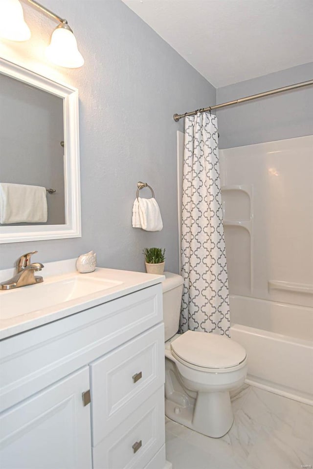 full bathroom featuring vanity, toilet, and shower / tub combo with curtain