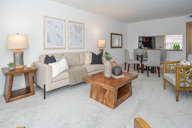 living room with light colored carpet