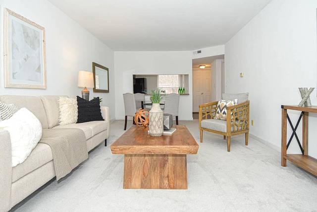 living room featuring light colored carpet