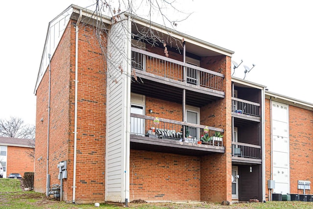 view of building exterior with central air condition unit