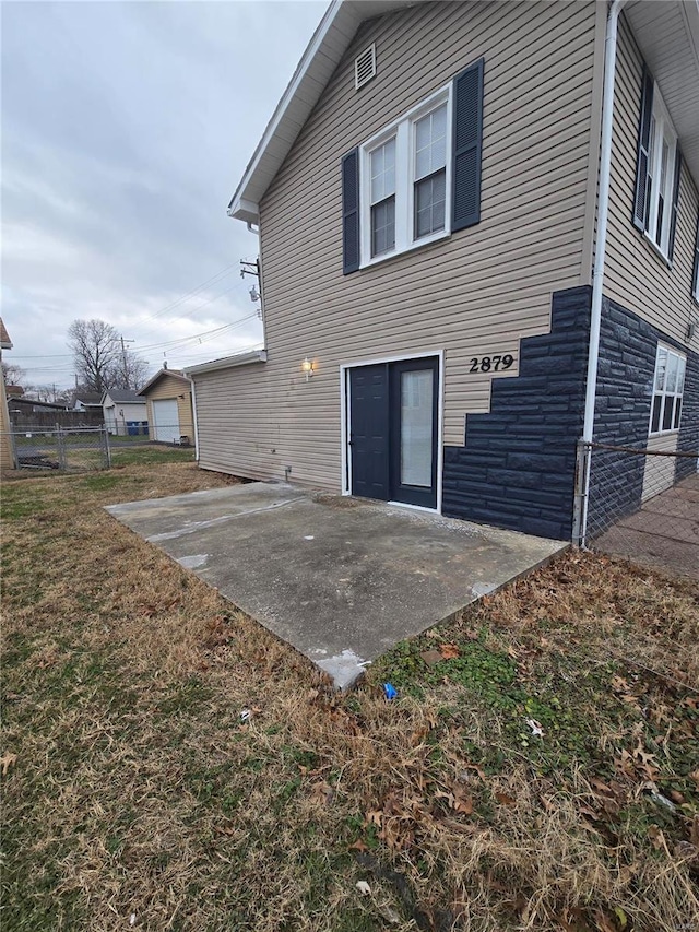 rear view of property with a patio