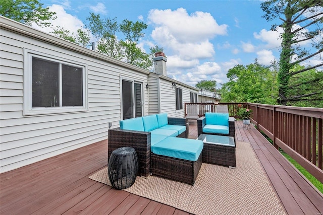 deck with outdoor lounge area