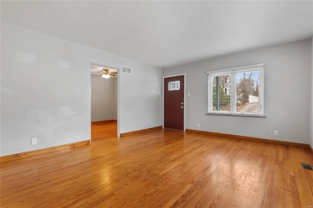 interior space with light hardwood / wood-style floors and ceiling fan