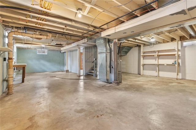 basement featuring heating unit