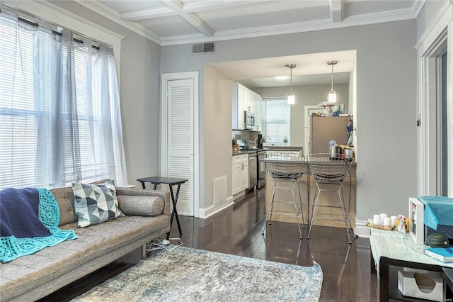 living room with beam ceiling, crown molding, dark wood-type flooring, and coffered ceiling