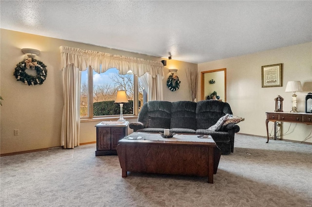 living room featuring light colored carpet and a textured ceiling