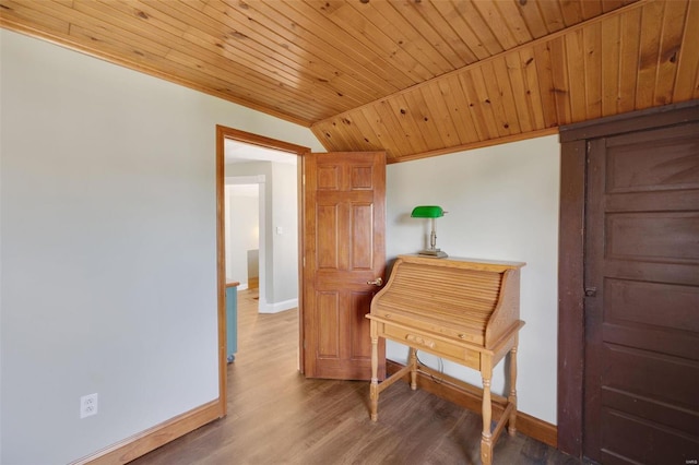 misc room featuring lofted ceiling, wood ceiling, and wood-type flooring