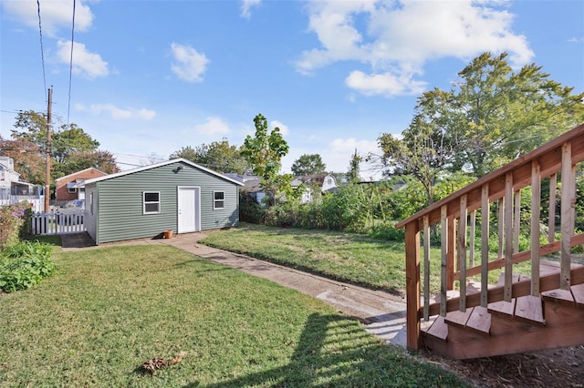 view of yard with an outbuilding