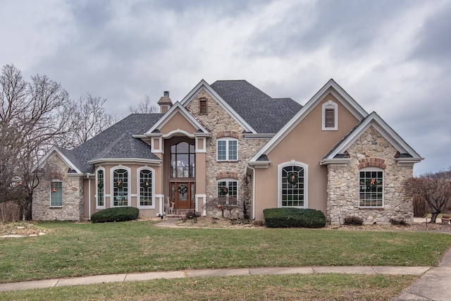 view of front facade with a front yard