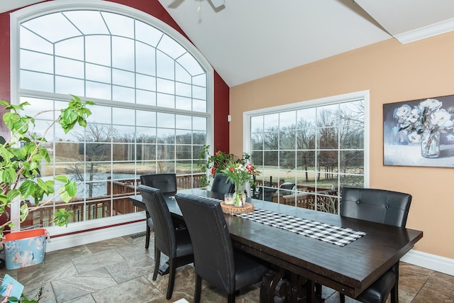 sunroom / solarium featuring vaulted ceiling