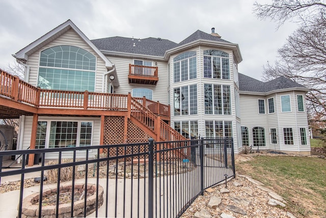 rear view of house with a deck