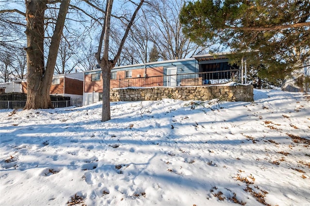 view of yard covered in snow