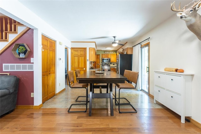 dining room featuring light hardwood / wood-style flooring