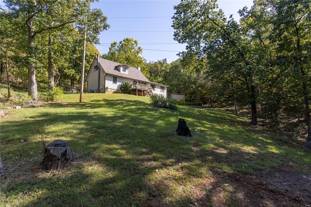 view of yard with a deck