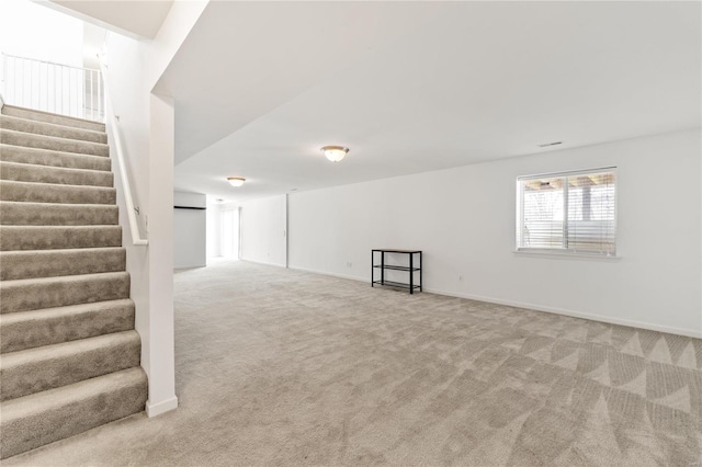 basement with carpet flooring