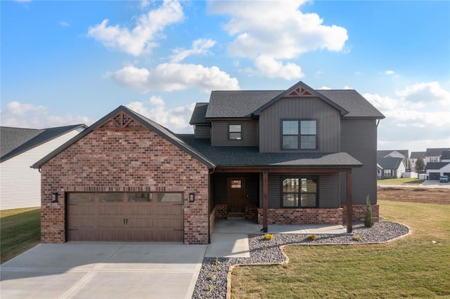 view of front of home with a front lawn and a garage