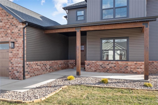 entrance to property with covered porch