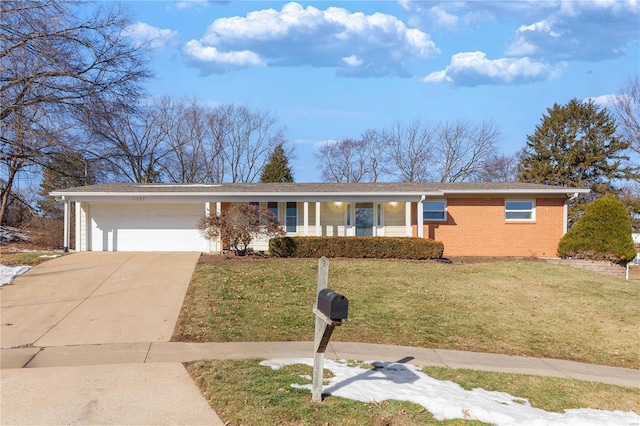 single story home with a garage and a front yard